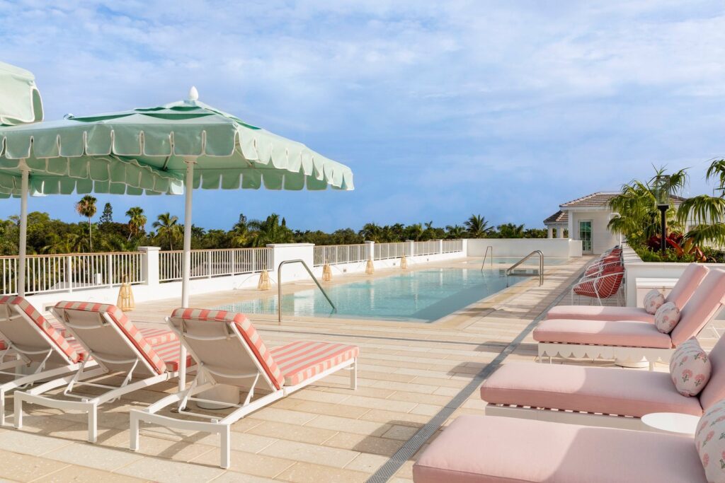 Retro rooftop pool with cabanas at Olde Naples Hotel, Naples, Florida