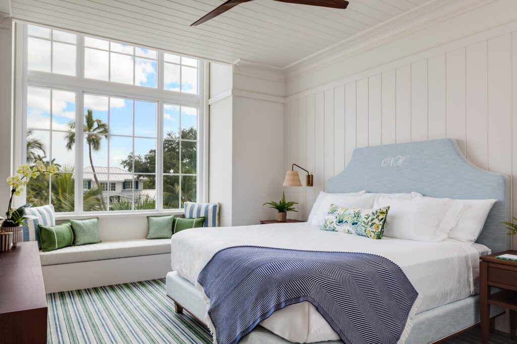 Primary bedroom of a two-bedroom suite at Olde Naples Hotel, Naples