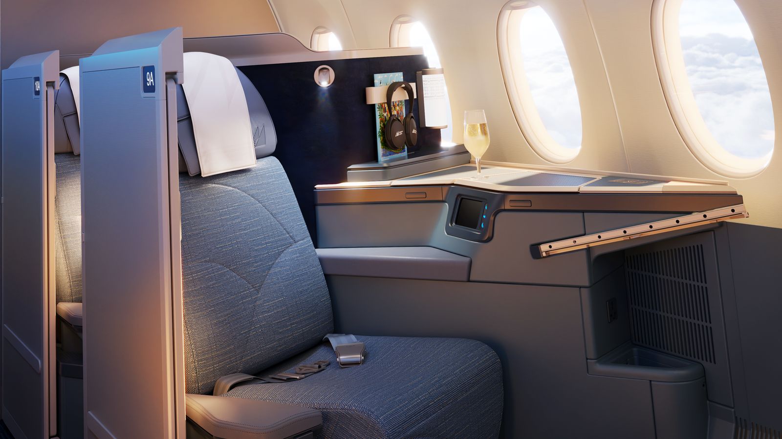 Rendering of a Philippine Airlines A350-1000 Business Class suite with its sliding privacy door open, flat-bed seat, screen and storage