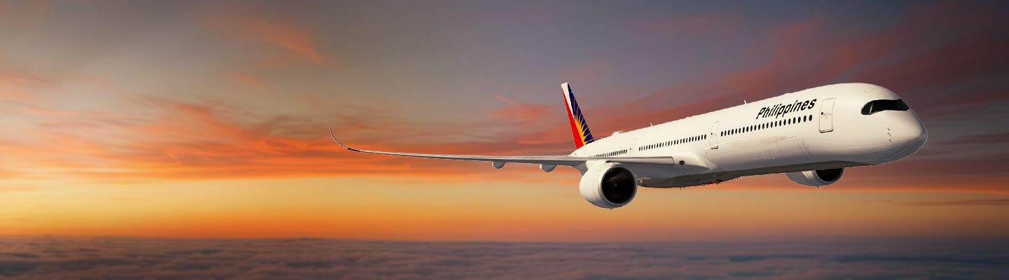 Philippine Airlines A350-1000 flying at sunset, showing the engine and tail livery