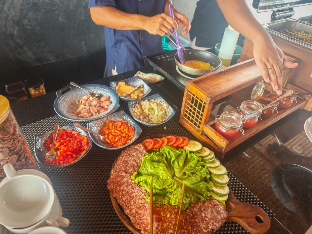 Chef cooking at the breakfast station on Scubaspa Zen