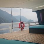 Deck of Scubaspa Zen with the karst islands of Misool in the background