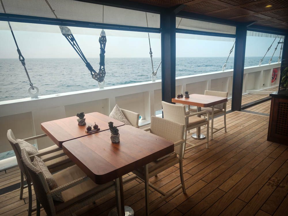 Dining tables on the main deck of Scubaspa Zen