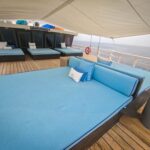 Shaded daybeds on the upper deck of Scubaspa Zen