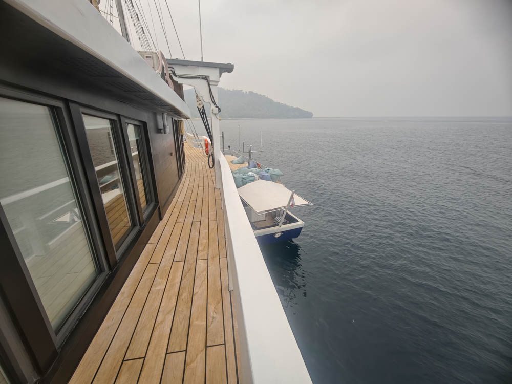 Side deck of Scubaspa Zen looking down at the boat alongside, ready for the next dive