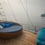 Round rattan daybed on the Scubaspa Zen sundeck