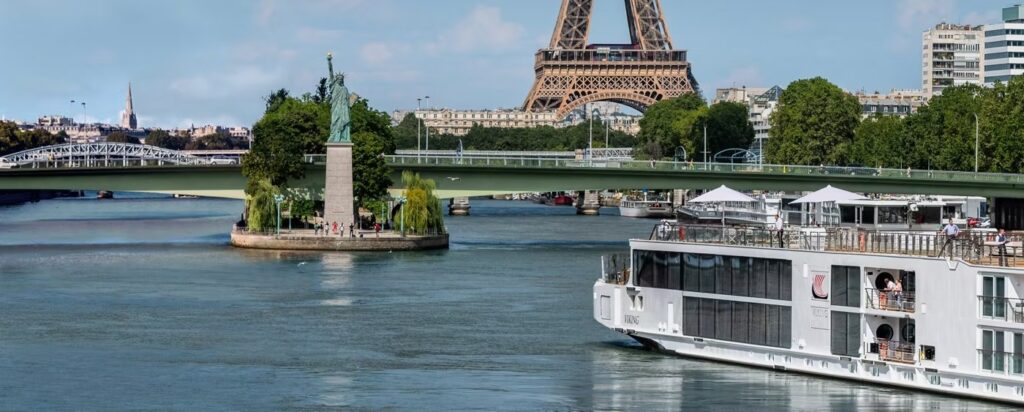 A Viking Seine-class ship moored in Paris with the Eiffel Tower behind, the class of the new Viking Fjolvar