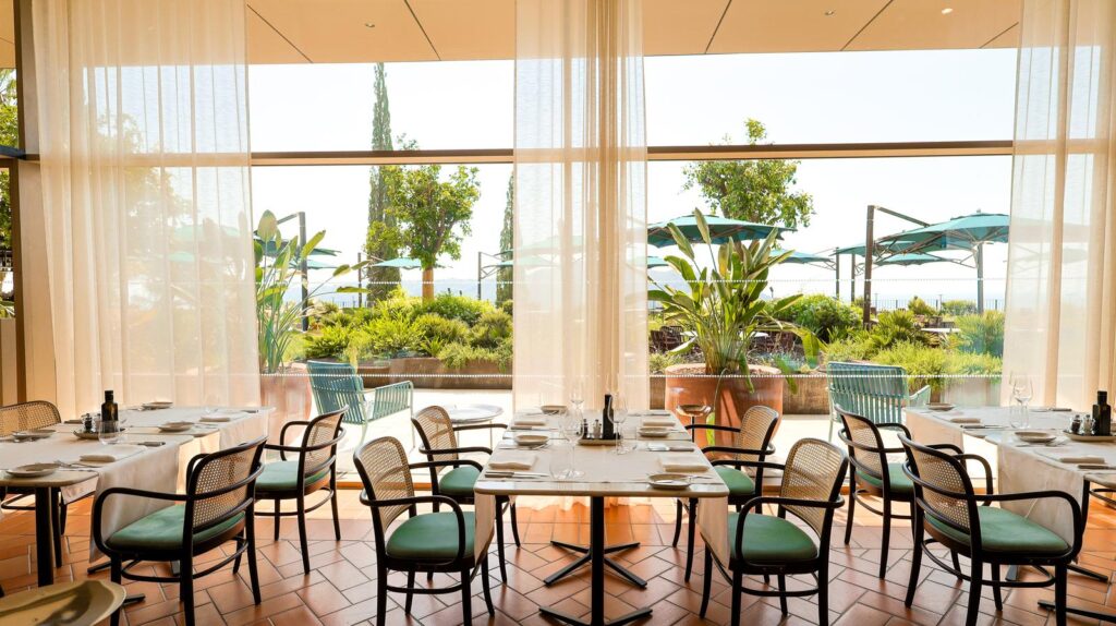 LIZ restaurant dining room opening onto the garden at Villa Argentina Dubrovnik