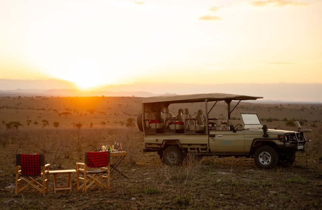 Sundowners on the Serengeti plains with Wild Wakati Camp