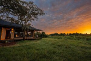 Tented suite at sunset at Wilderness Mara in the Mara Triangle, Kenya